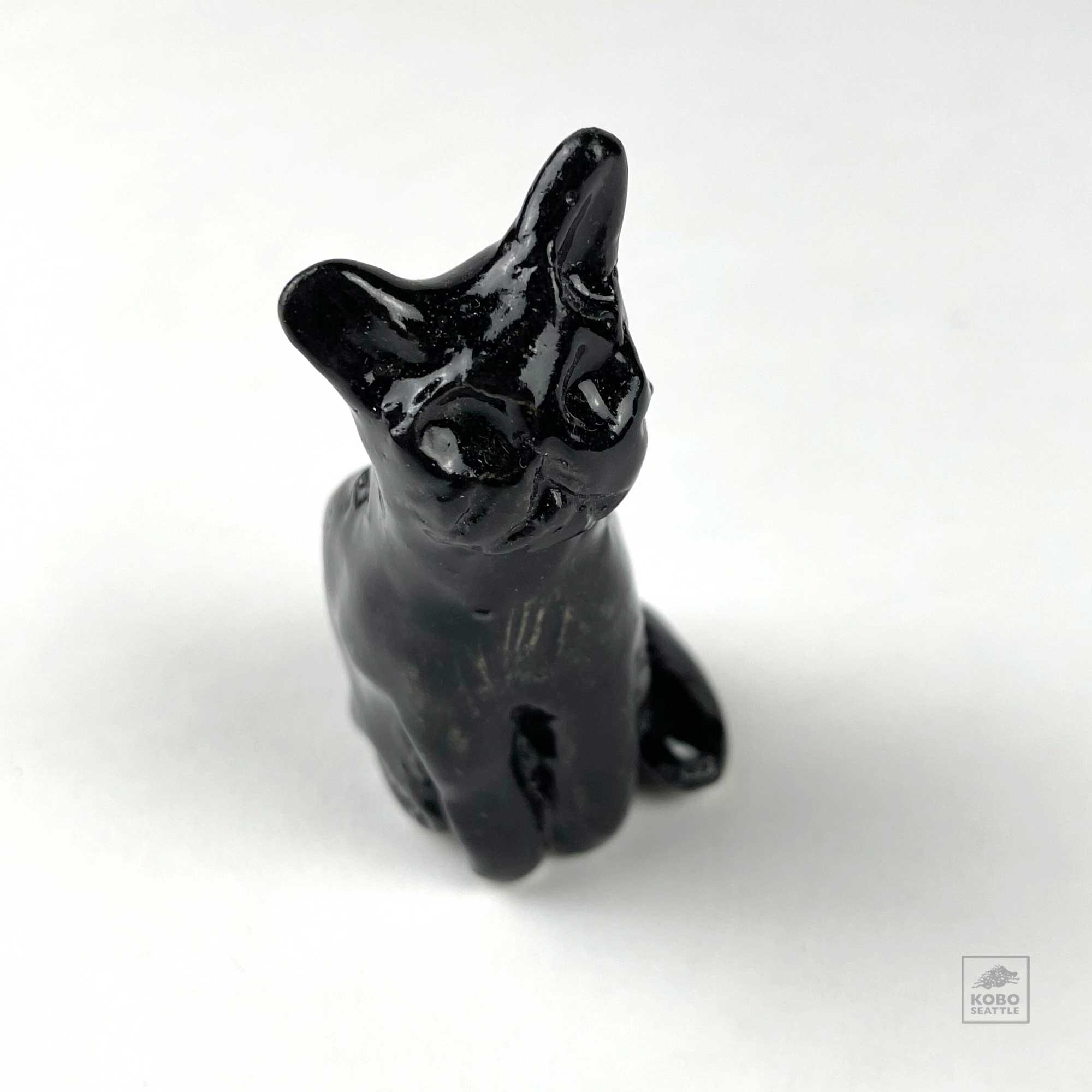 Sitting Black Cat by Aaron Murray