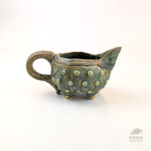 Barb Campbell - Creamer With Handle and Green Dots