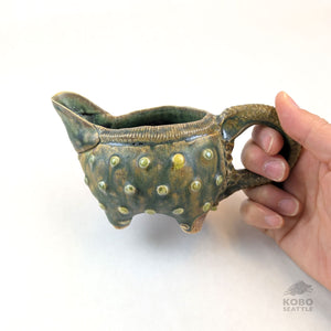 Barb Campbell - Creamer With Handle and Green Dots