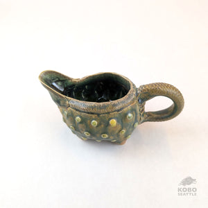 Barb Campbell - Creamer With Handle and Green Dots