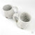 Dark Clay with White Mugs by Brendan Fuller