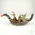 Eagle, Frog, and Wolf in a Duck Canoe by Aaron Murray