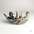 Rabbit, Wolf, and Bear in Duck Canoe by Aaron Murray