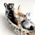 Rabbit, Wolf, and Bear in Duck Canoe by Aaron Murray