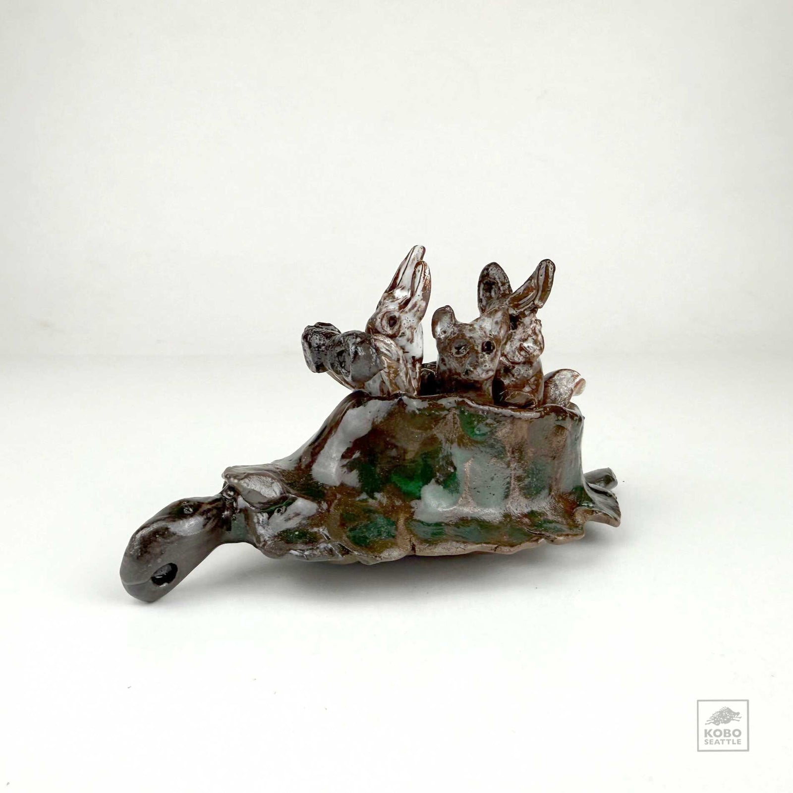Rabbit, Cat and Wolf in a Turtle Canoe by Aaron Murray