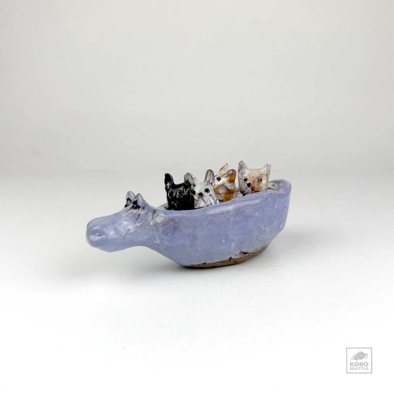 Four Cats in a Hippo Canoe by Aaron Murray