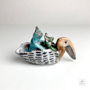 Frog and Bear in Pelican Canoe by Aaron Murray