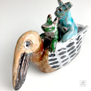 Frog and Bear in Pelican Canoe by Aaron Murray