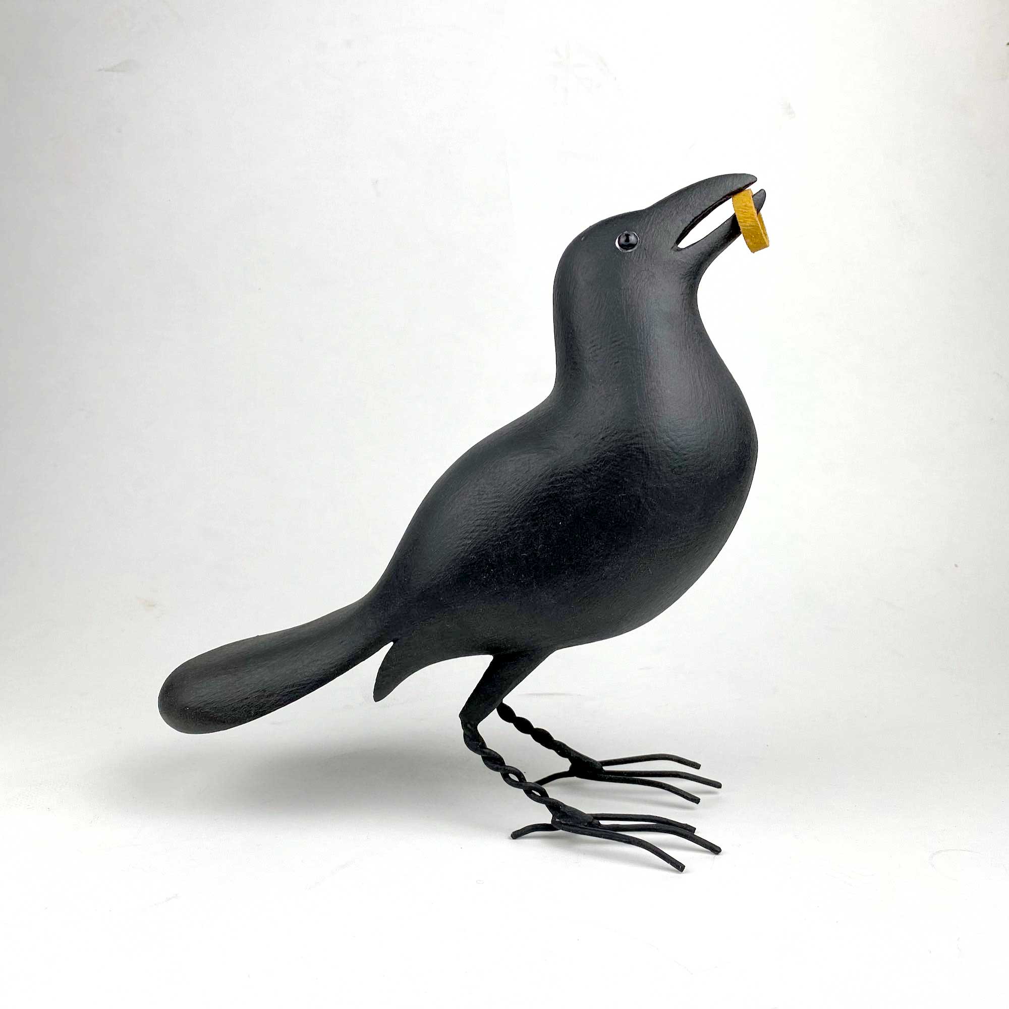 Crow with Ring Wood Carving