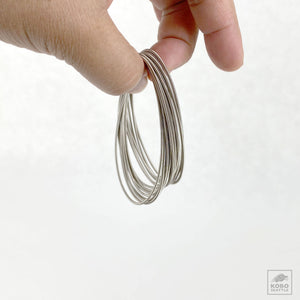 Stainless Steel Coil Bracelets - Set of 15